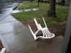 Wind-toppled chair out front