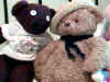 Teddy and Nicholas, with their heads together