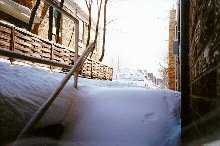 Back stairwell filled with snow!